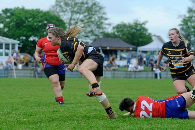 Tia Larson slips the tackle on theway to scoring Hants 2024